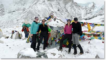Standing at the official Everest Base camp sign.
